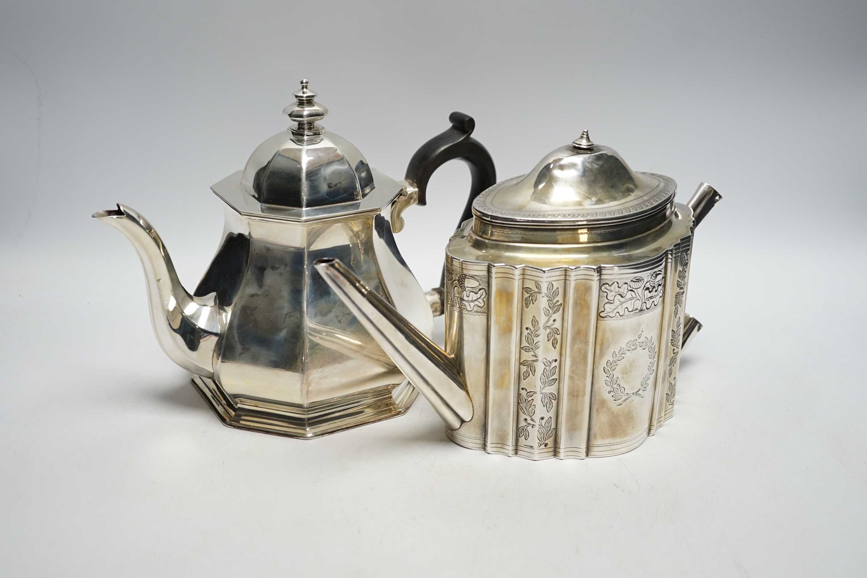 A George V silver octagonal teapot, Atkin Brothers, Sheffield, 1932, together with a George III silver teapot, Robert & David Hennell, London, 1795, (no handle or finial, gross weight 44.9oz.